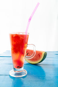 Close-up of juice and drink on table