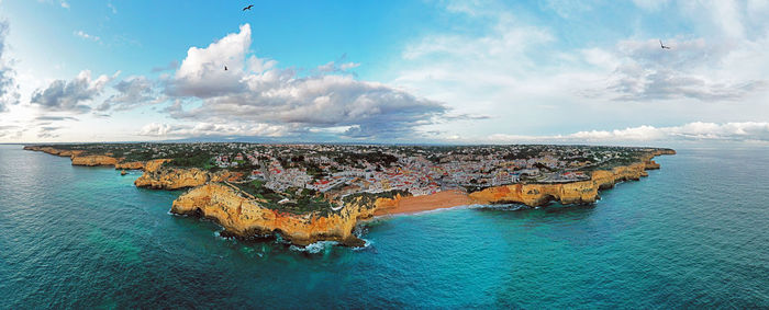 Panoramic view of island against sky