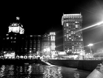 Illuminated buildings at waterfront