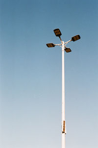 Low angle view of street light against clear sky