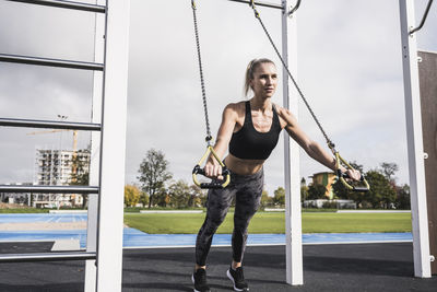 Young athlete exercising at sports track