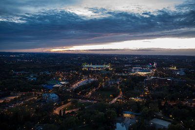 High angle view of illuminated buildings in city against sky