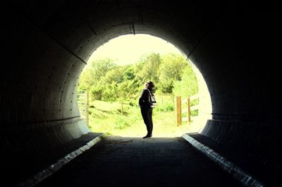 People walking in tunnel