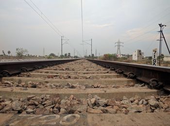 Railroad tracks against sky