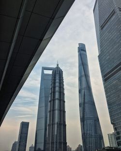 Low angle view of skyscrapers against sky