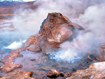 Smoke emitting from volcanic mountain