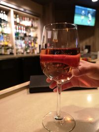 Glass of wine on table in restaurant