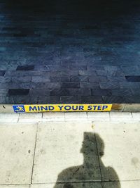 High angle view of text on road