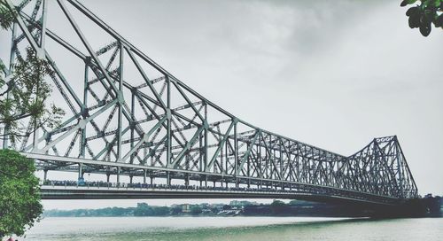 Low angle view of bridge over river