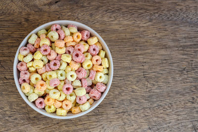 High angle view of chopped fruits in bowl on table