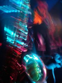 Low angle view of illuminated ferris wheel