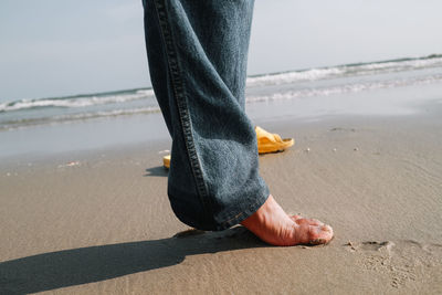 Low section of person on beach