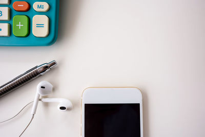 High angle view of mobile phone on table