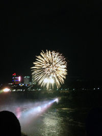 Fireworks display at night