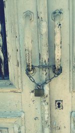 Close-up of padlocks on door