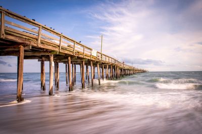 Low angle view of bridge over sea