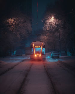 Illuminated street at night