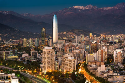 Illuminated buildings in city at night