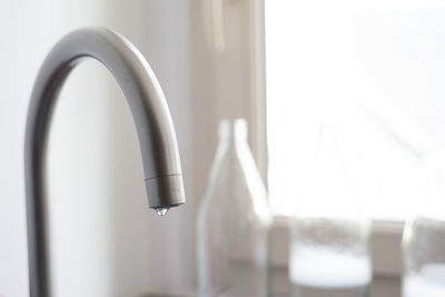 Close-up of faucet at home