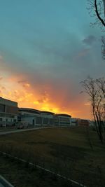 Buildings against sky during sunset