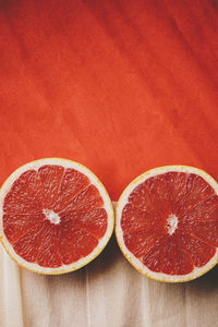 Close-up of lemon slices on wooden table