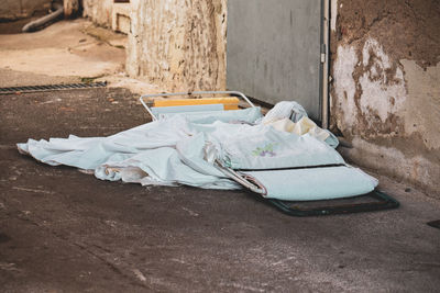 High angle view of garbage on footpath