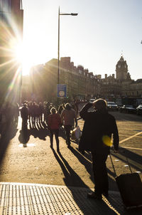 People walking on street in city