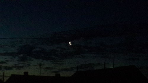 Low angle view of moon in sky