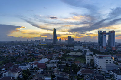 High angle view of townscape against sky during sunset