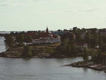 River by town against sky