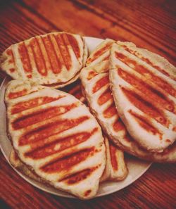 Close-up of bread in plate on table