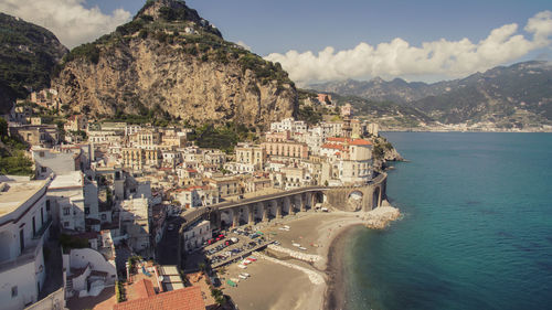 High angle view of town by sea