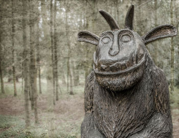 Close-up portrait of horse against trees