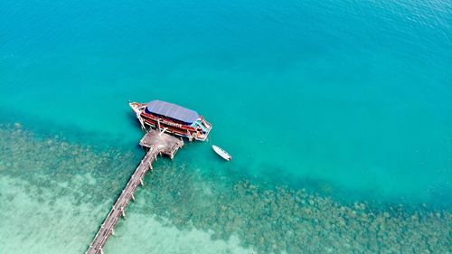 High angle view of ship sailing in sea