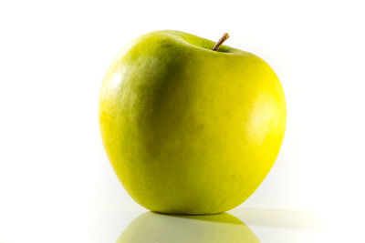 Close-up of apple against white background