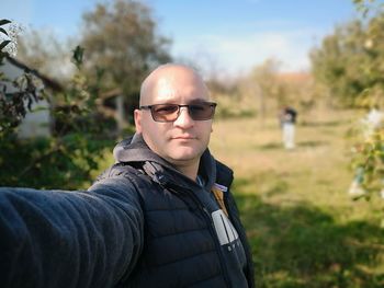 Portrait of man wearing eyeglasses