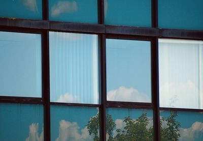 Full frame shot of glass window against building