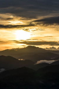 Scenic view of mountains against sky during sunset