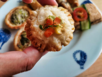 Close-up of hand holding food