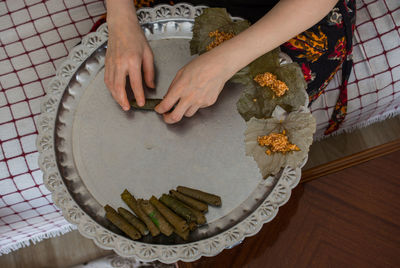 High angle view of woman standing on table