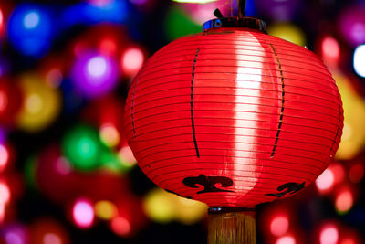 Close-up of illuminated lantern hanging at night