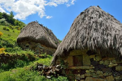 A traditional hute with thatched roof. braña la pornacal, somiedo, asturias, northern spain.