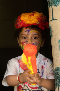 Portrait of young woman drinking juice