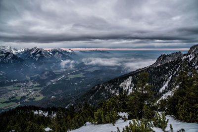 Scenic view of snowcapped mountains against sky