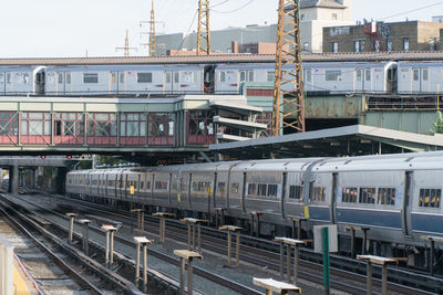 Train at railroad station in city