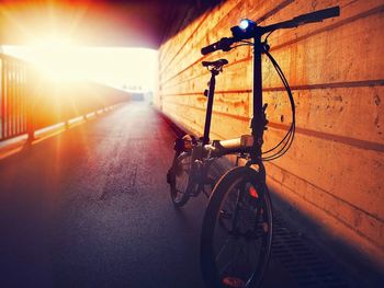 Bicycle on street in city during sunset