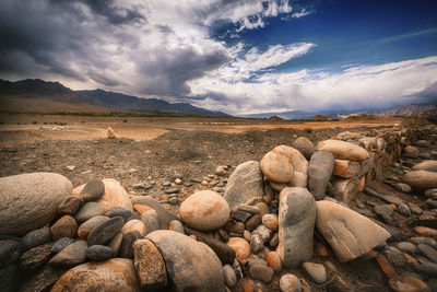 Rocks on land against sky