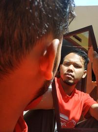 Portrait of young man looking away