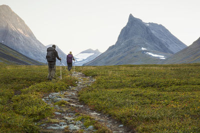 A man and a woman hiking