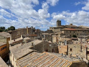High angle view of old buildings against sky
